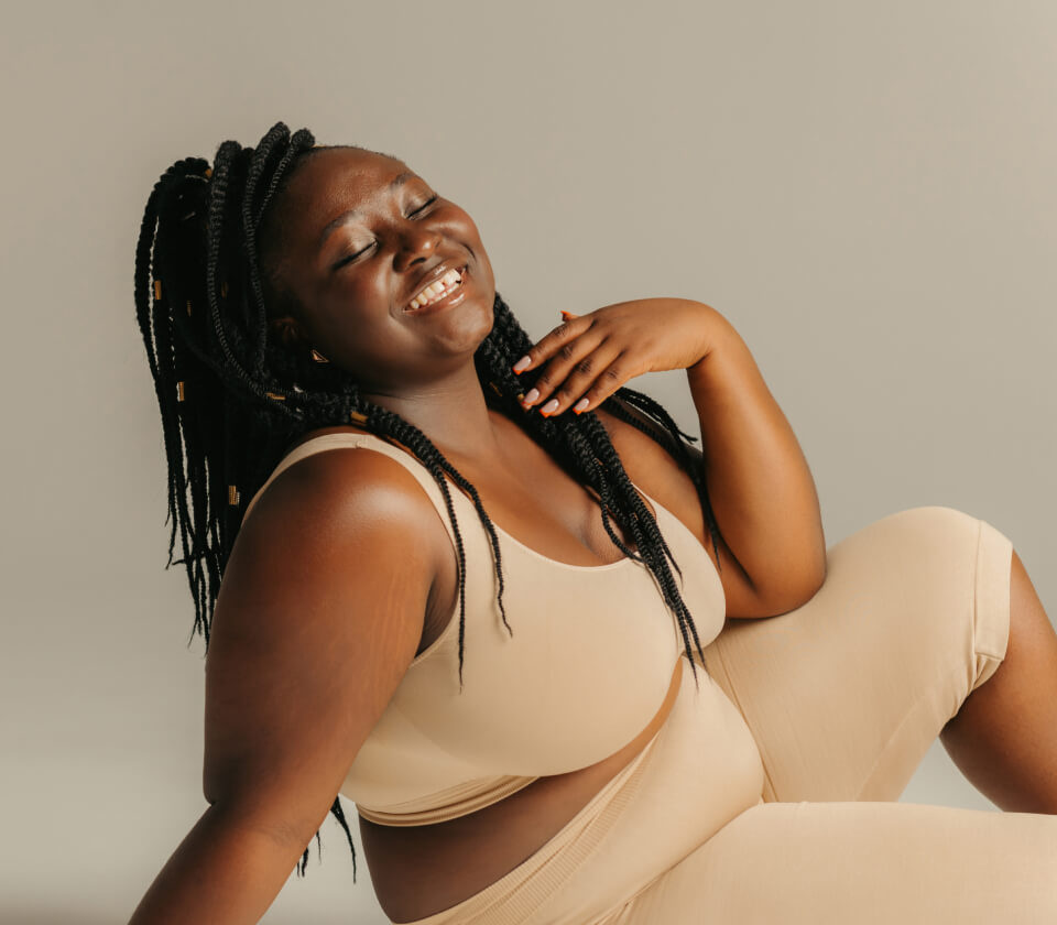 joyful-plus-curvy-african-woman-in-sportswear-radi-2023-11-27-05-12-49-utc 1 (1)