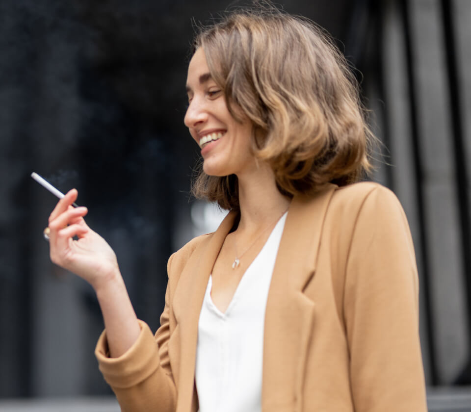 woman-smoking-cigarettes-during-break-at-work-2023-11-27-05-27-36-utc 1 (1)